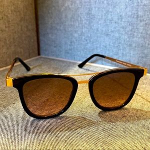 Black and rose gold Nanette Lepore sunglasses